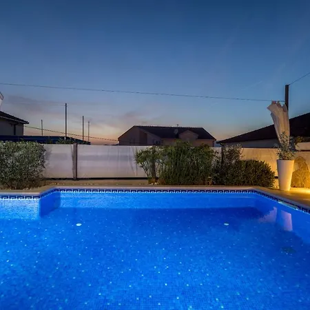 Ines With Pool By The Holiday home